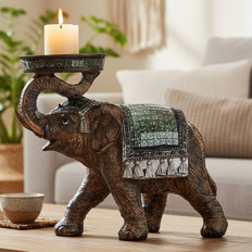 Kerzenhalter Elefant Dekorativer Kerzenhalter in Form eines Elefanten mit brennender Kerze auf dem Rücken