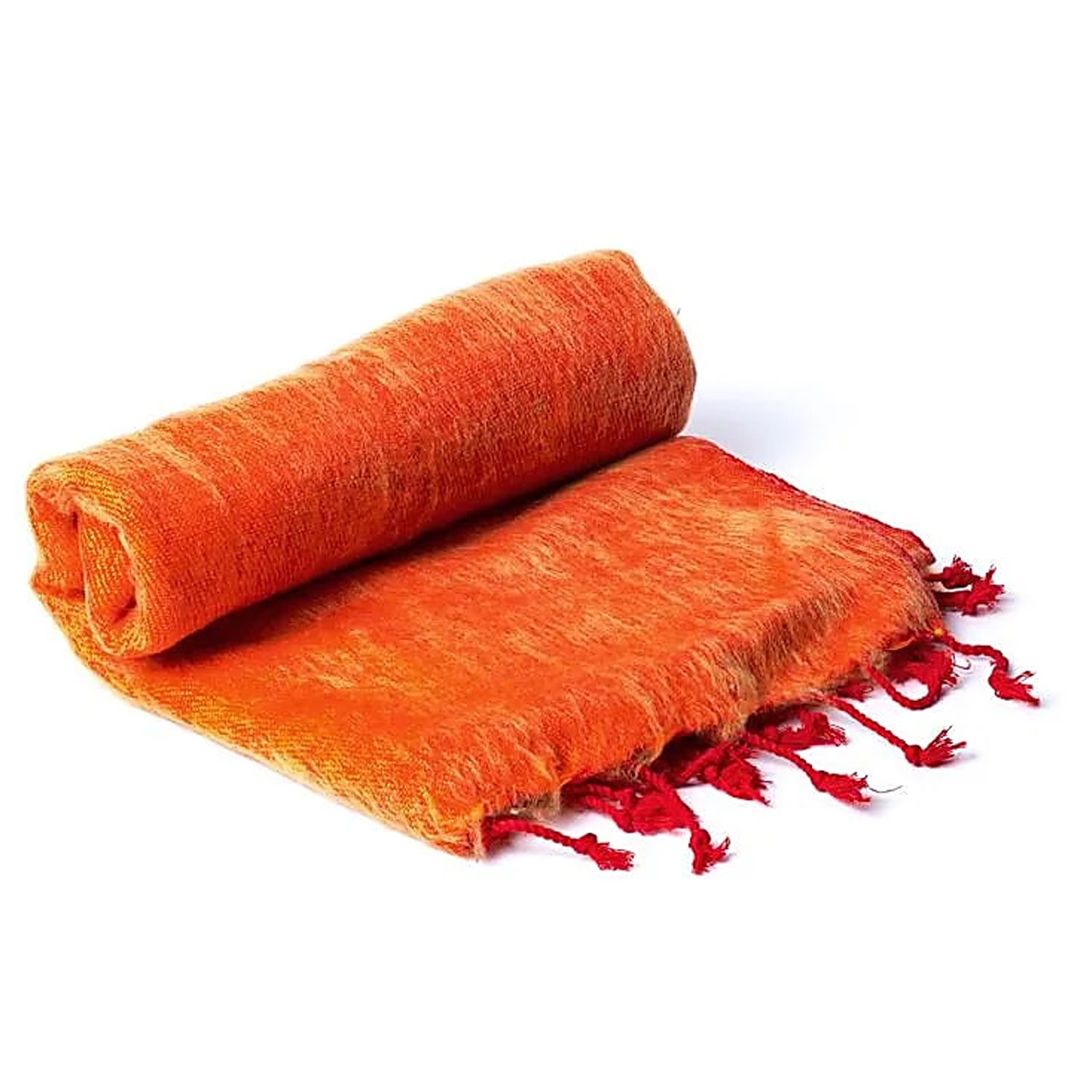Eine orange-rote Decke mit roten Fransen, teilweise aufgerollt