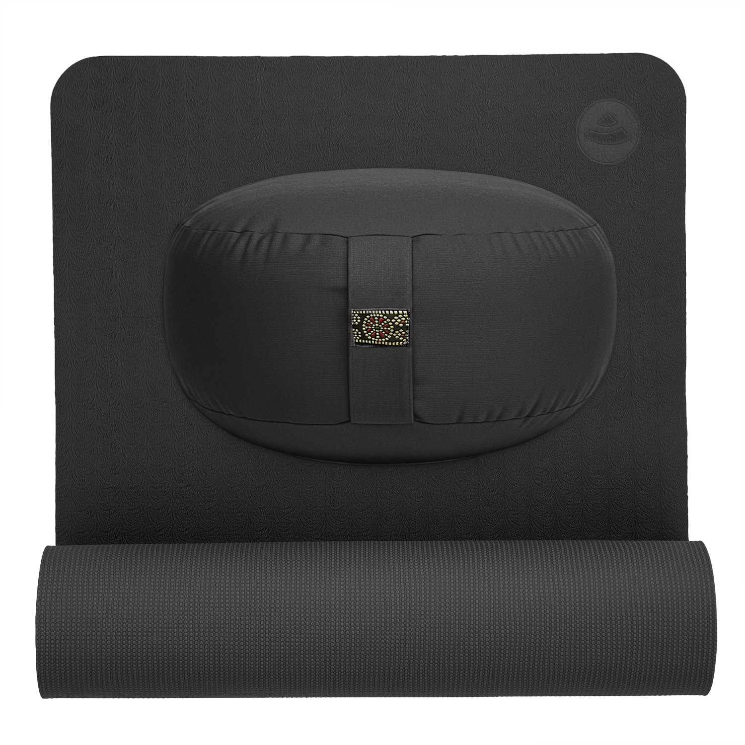 Schwarze Meditationsmatte mit rundem Kissen darauf