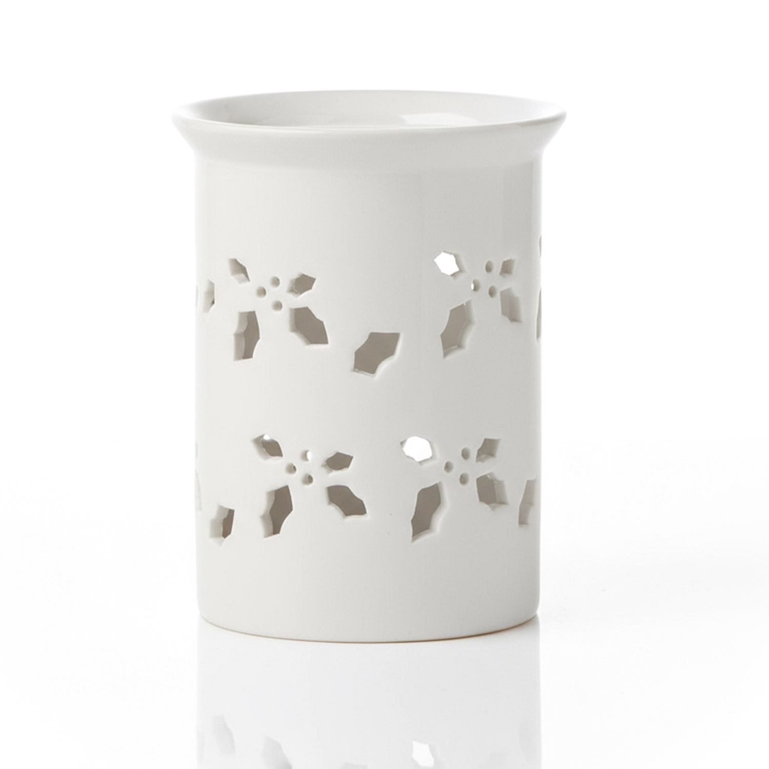 Weißer Kerzenhalter mit ausgestanztem Sternmuster