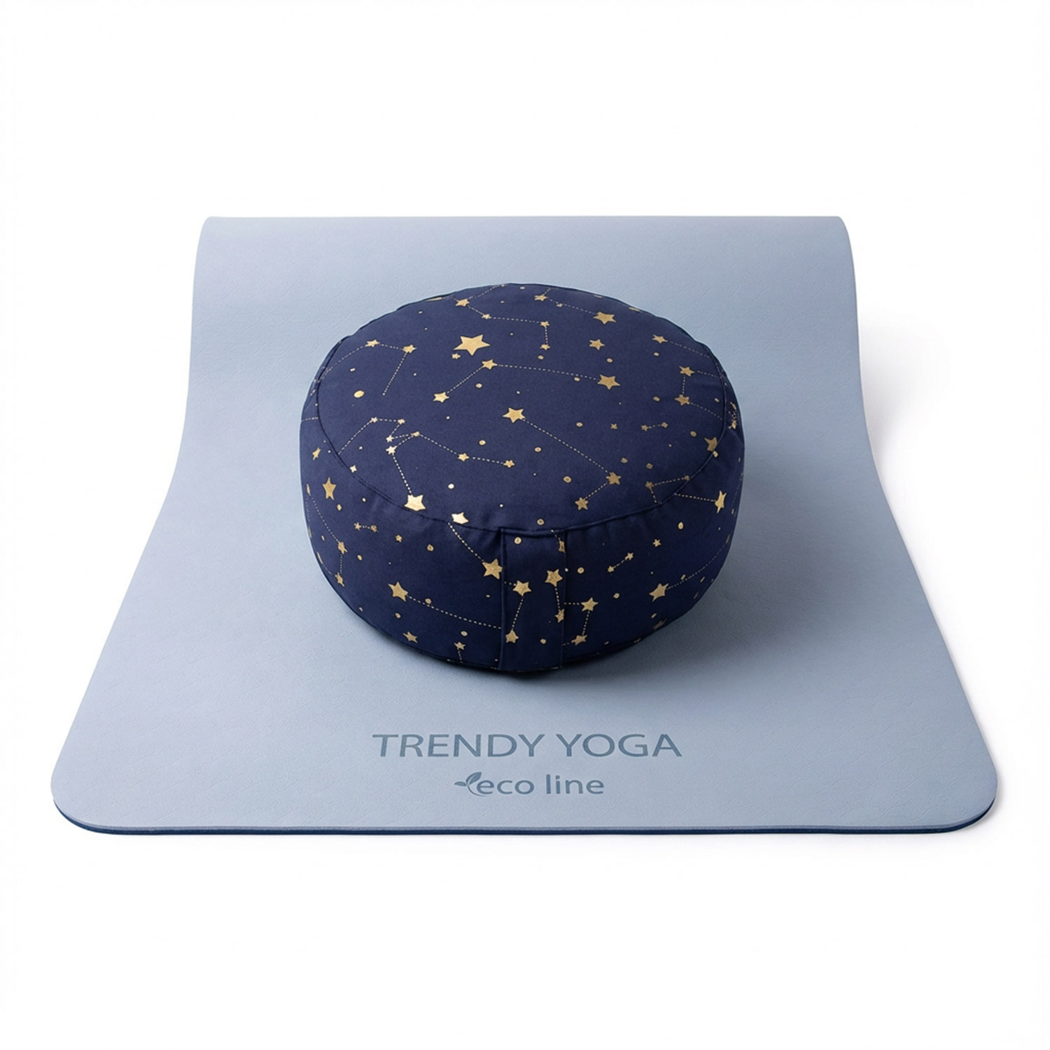 Blaues Meditationskissen mit Sternenmuster auf Yogamatte